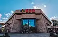 View on shopping mall in Shymkent, called ЦУМ in the Russian/Soviet style