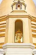 Statue of King Rama IV in a niche at Wat Bowonniwet