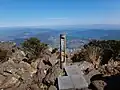 The summit of Mt. Kaimon with Lake Ikeda in the background