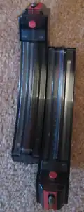 Two Ruger 10/22 magazines attached.