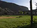 A view across one of two central parks of Yucay
