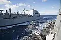 USS Carney receives cargo from the Military Sealift Command dry cargo/ammunition ship USNS William McLean during a replenishment-at-sea in the Mediterranean Sea, 2016.