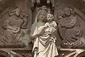 Madonna at the entrance lintel of Saint André