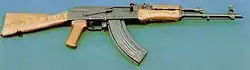 AKM with lighter stamped-steel receiver and muzzle-brake