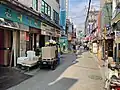 Paper delivery packed in front of the shop of a paper wholesaler