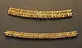 Two sets of golden beads