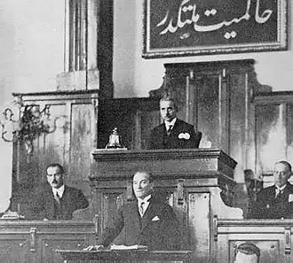 “Hakimiyet Milletindir” (lit. "Sovereignty belongs to nation") calligraphy was written by Mehmed Hulusi Yazgan in Ottoman Turkish script. This calligraphy is shortest style of Hakimiyet bila kaydü şart Milletindir phrase in law.