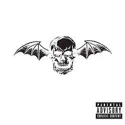A human skull with bat wings protruding out of its ears on top of a white background.