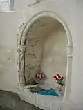 A recess in the Church.