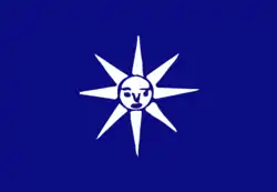 Image of a cream sun with a face set on a blue background