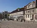 Old architecture with town hall in background