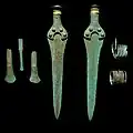 Swords and other finds buried with the disc