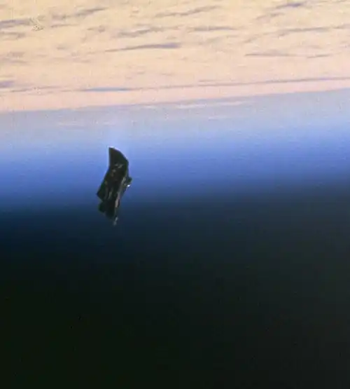Image 4A drifting thermal blanket photographed in 1998 during STS-88 (from Space debris)