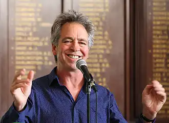 Image 7 Brian Nankervis Photo: John O'Neill; edit: JJ Harrison Brian Nankervis (b. 1956), an Australian comedian and writer, shown here during a live performance. Nankervis rose to popularity while playing Raymond J. Bartholomeuz on Hey Hey It's Saturday; since 2005 he has been a host of the gameshow RocKwiz. More selected portraits
