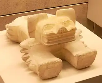 Alabaster statue of an ocelot from Teotihuacan, 5th–6th centuries, possibly a ritual container to receive sacrificed human hearts (British Museum)[121]
