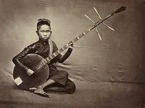 Cambodia, Chapei dong veng (ចាប៉ីដងវែង) and Thailand grajabpi (กระจับปี่), c. 1880. Origin uncertain: China (ruan or yueqin), Islamic (rubab or tanbir), India ("chapei derives from the Sanskrit kacchap(î)" turtle shell, used for sound bowl).[99]