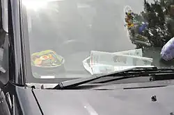 Canang inside a car
