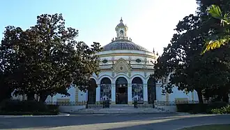 One entrance of the pavillon, the entrance leads through the Casino of the building