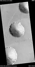 Pit crater chain in Ceraunius Catena, as seen by HiRISE.