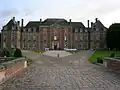 The rebuilt château, main facade; circa 2007.