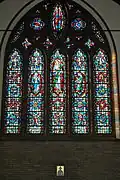 The west window with references to Waltham's industries