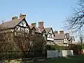 Church Cottages, 5-8 Belle Vale Road, Gateacre (1872; Grade II)