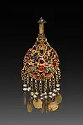 Earring with Vishnu riding Garuda; c. 1600; gold set with jewels and semi-precious stones; overall: 2.6 centimetres (1.0 in); from Nepal; Cleveland Museum of Art (Cleveland)