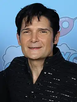 Feldman looking towards a camera