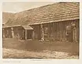 Cowichan housefront with carved house posts