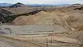 A new leaching pad being constructed where the ore will be leached in 100 feet layers, extracting the silver-gold-telluride from the mostly lamprophyre diatreme breccias.