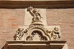 Putti and Latin motto.