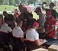 Nicholls seated on right