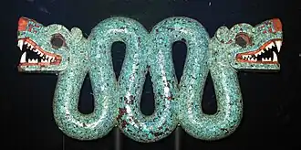Double-headed serpent (Aztec); c. 1450–1521; cedar, turquoise, shell and traces of gilding; length: 43.3 cm; British Museum[72]