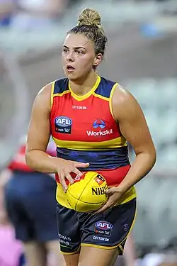 Marinoff preparing to kick a football