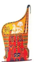 Egyptian Armchair with a cushion hanging over its back