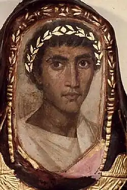 Room 62 – Detail from the mummy case of Artemidorus the Younger, a Greek who had settled in Thebes, Egypt, during Roman times, 100–200 AD