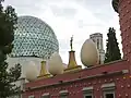 Image 27The Dalí Theatre and Museum, commemorating Salvador Dalí in his home town of Figueres, Catalonia, has a geodesic dome and is decorated with giant eggs.