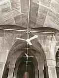 Four arc shape pillars with midpoint lock at roof top