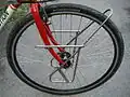 A low rider mounted on a touring bicycle for mounting panniers.