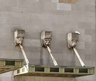 Art Deco mascarons on the Graybar Building, New York City, by Sloan & Robertson, 1925-1927[54]