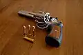 GP100 (KGP-161) with opened cylinder and .357 Magnum ammunition