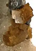 Siderite crystals with galena and quartz. Size: 6.2 cm × 4.1 cm × 3.6 cm (2.4 in × 1.6 in × 1.4 in)
