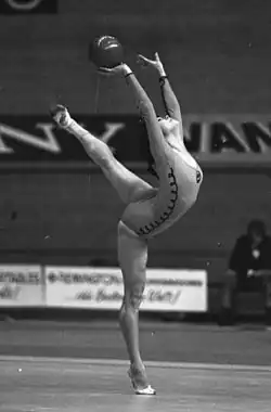 Shugurova balances with the ball in her hand