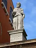 The statue with the inscription