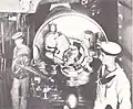 The starboard 12-inch (305 mm) Mark VIII gun in one of the turrets aboard the British battleship HMS Caesar. The gun's breech is closed.