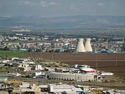 Image 44The oil refinery in Haifa, Israel, is capable of processing about 9 million tons (66 million barrels) of crude oil a year. Its two cooling towers are landmarks of the city's skyline. (from Oil refinery)