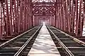 Image 20Hardinge Bridge is a steel railway bridge over the river Padma located at Paksey, Ishwardi, Pabna in western Bangladesh. It is named after Lord Hardinge, who was the Viceroy of India from 1910 to 1916. The bridge is 1.8 kilometres (1.1 mi) long. Photo Credit: Azim Khan Ronnie