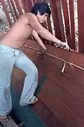 Hasni Ali building the bedar Naga Pelangi, Duyong, 1981