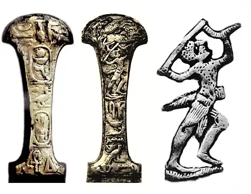 Electrum dagger handle of a soldier of Hyksos Pharaoh Apepi, illustrating the soldier hunting with a short bow and sword. Inscriptions: "The perfect god, the lord of the two lands, Nebkhepeshre Apepi" and "Follower of his lord Nehemen", found at a burial at Saqqara.[46] Now at the Luxor Museum.[47][48]