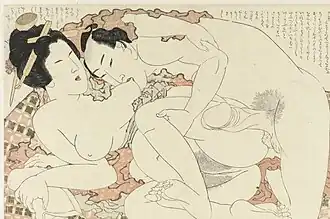 Shunga depicting a man sucking a woman's breasts. Japan 1815–1823.